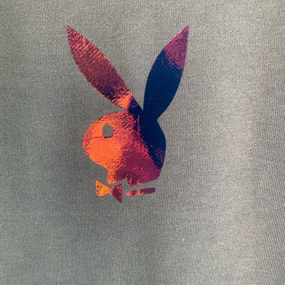 Light blue sweatshirt/ playboy decal
